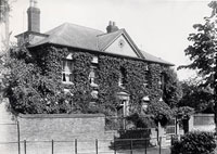 black and white photo of Touchwood Manor House