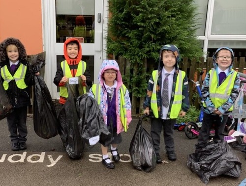 An image of children at Valley School on a litter pick