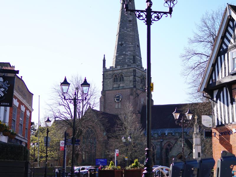 A view of St Alphege Church from the high street in Solihull