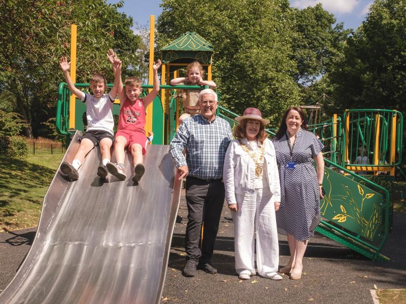 Cllr Ken Hawkins, the former Mayor of Solihull Cllr Diana Holl-Allen and Cllr Gethen with local children at a playground funded by CIL