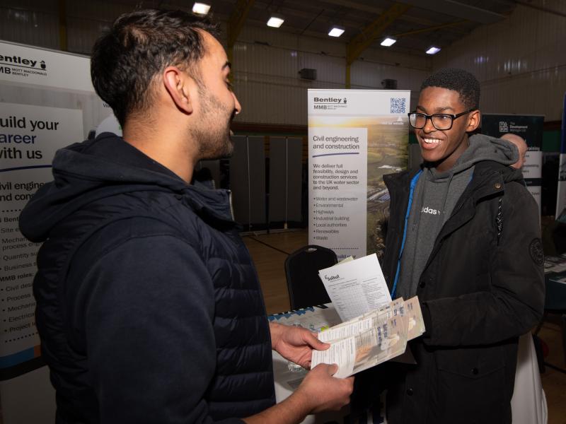 A student learning about apprenticeships at the previous apprenticeship show.