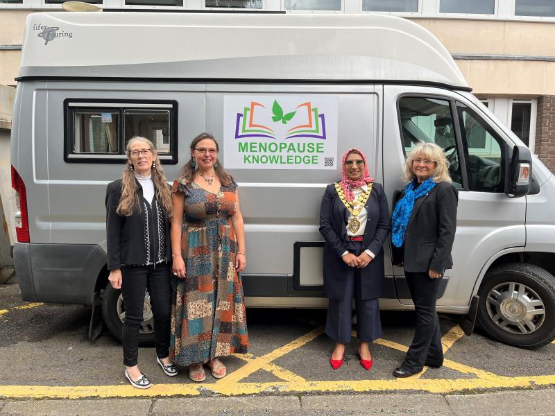 The Mayor of Solihull stood in front of the Menopause knowledge bus